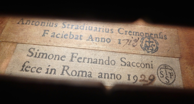 Label of the 1929 viola, showing Sacconi's practice of placing his own label next to a facsimile of the original